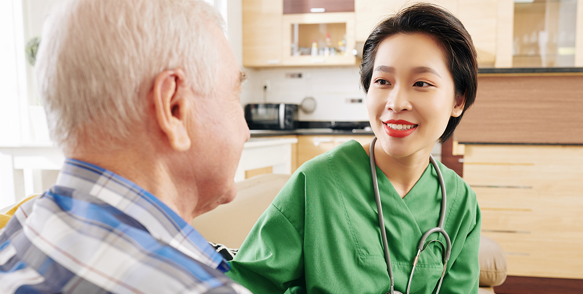 doctor using computer with tech graphics